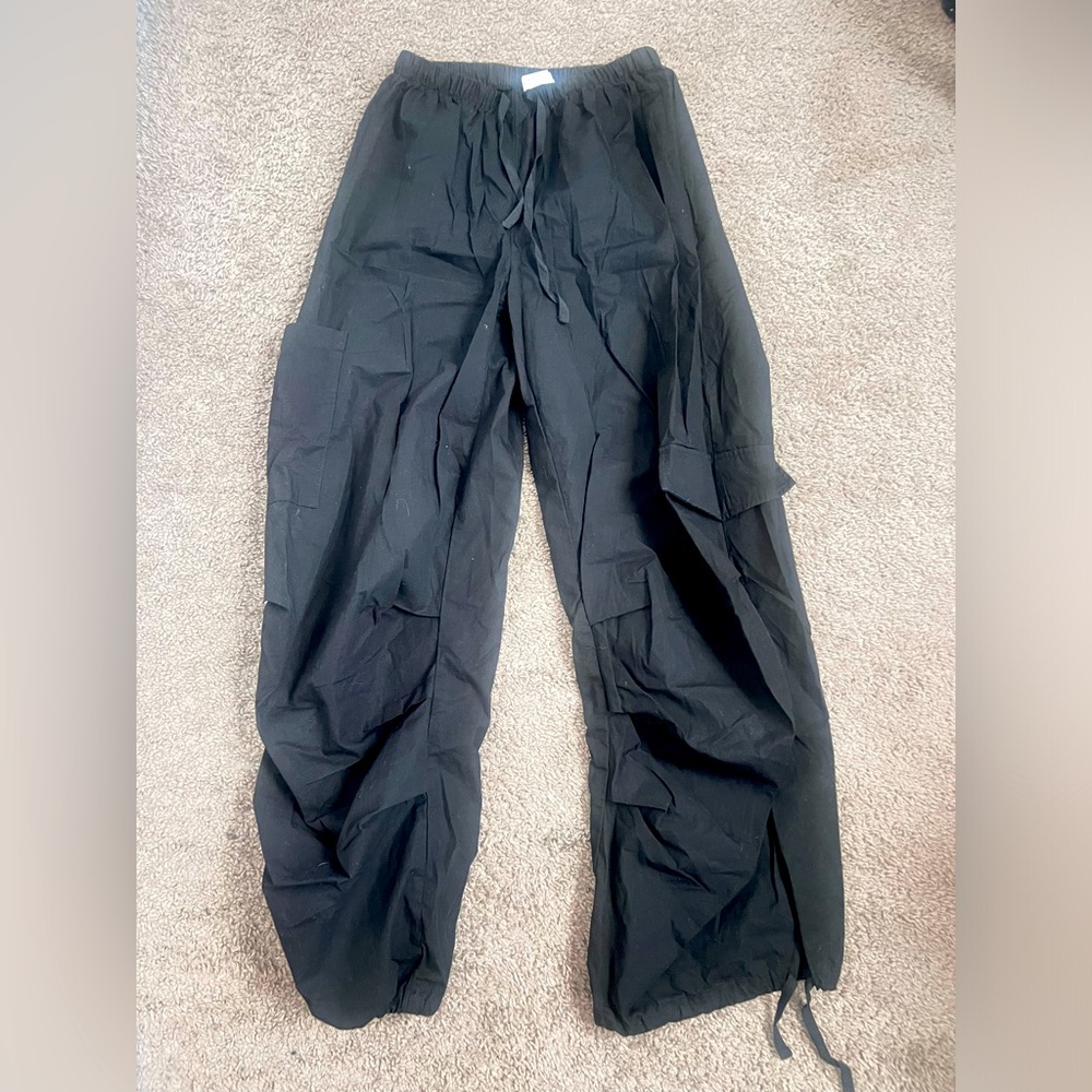 Black string parachute cargo pants